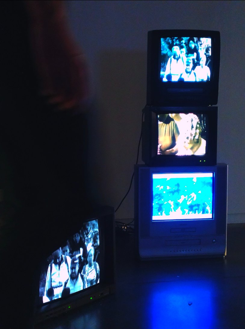 Limen installation with archival footage on CRT screens